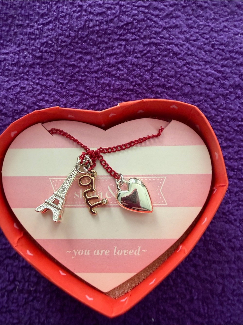 Stella & Dot necklace with silver Heart, Silver Eiffel Tower & Gold “Oui” charms